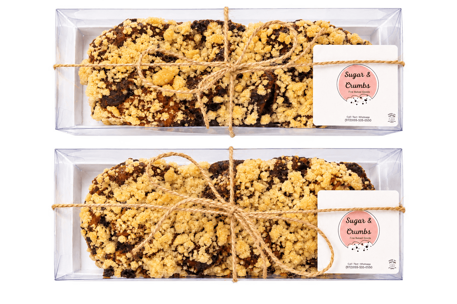 Two handmade chocolate babka loaves in gift boxes