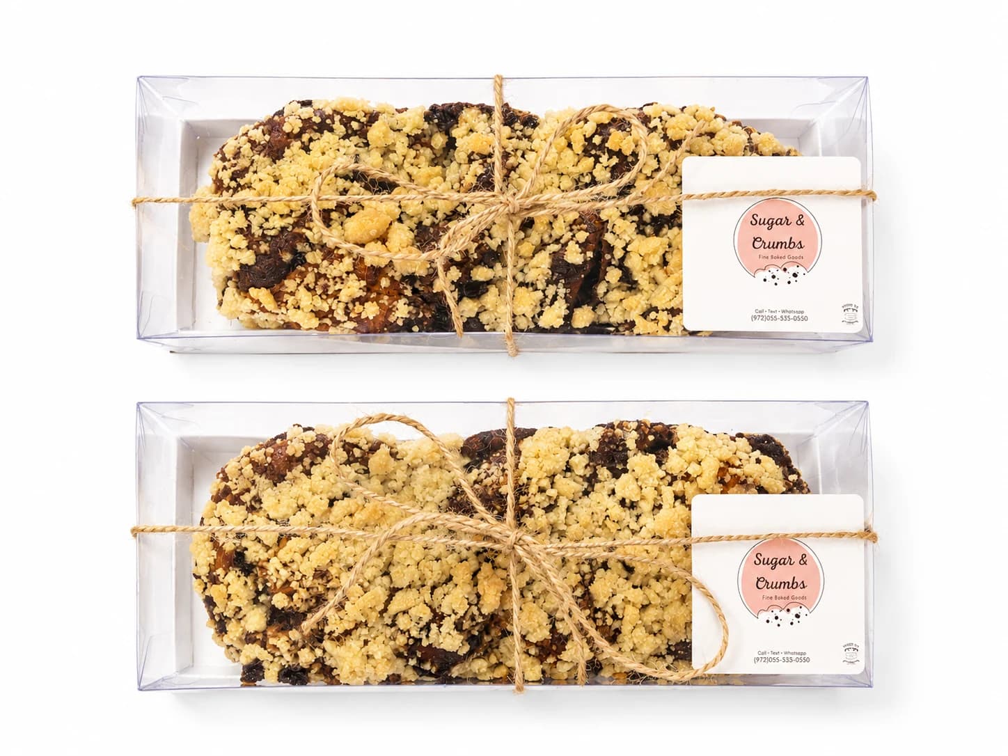A Sugar and Crumbs chocolate babka loaf wrapped and tied for gifting