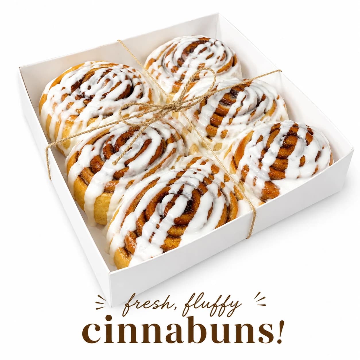 Close view of freshly iced Sugar and Crumbs cinnamon buns